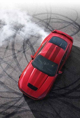 Overhead view of a 2024 Ford Mustang® model with tire tracks on pavement | Sentry Ford in Medford MA